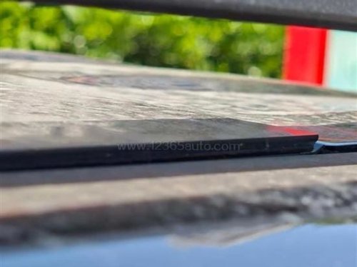 BYD, Leaks and flooded charge ports: BYD Ti7 owners in China report detached glass roofs