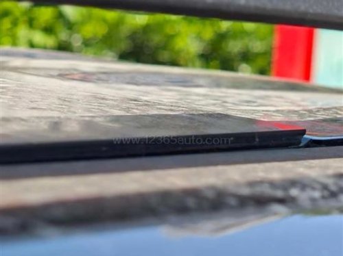 BYD, Leaks and flooded charge ports: BYD Ti7 owners in China report detached glass roofs