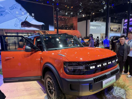 I went to the Beijing Auto Show and it's a glimpse at the future of the auto industry