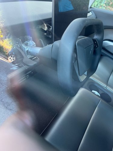 Tesla, Cybertruck, First look at Tesla Cybercab’s steering: a Cybertruck wheel bolted on