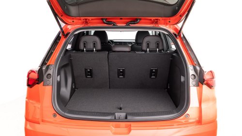Tesla Model 3 vs. 2027 Chevy Bolt Comparison Test: Clash of the Affordable EVs