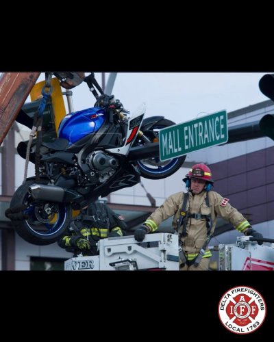 BMW, Motorcycle Left Hanging from Traffic Light After Dramatic BMW 3-Series Crash