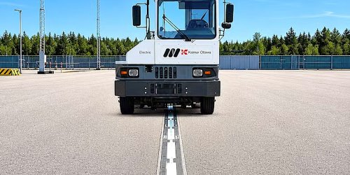 Super-sized slot cars: these Kalmar trucks NEVER need plugged in