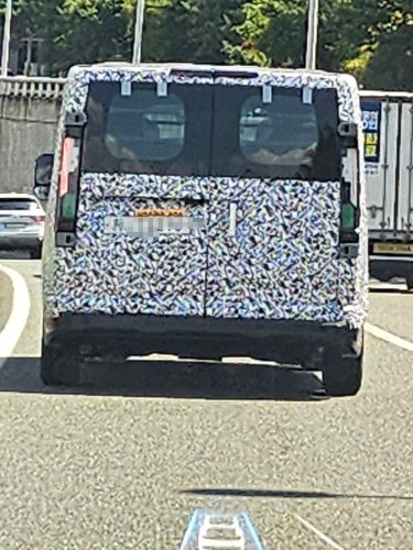 Kia, Kia's larger EV van caught with less camo ahead of debut [Images]