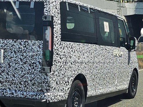 Kia's larger EV van caught with less camo ahead of debut [Images]