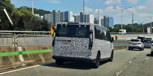 Kia's larger EV van caught with less camo ahead of debut [Images]