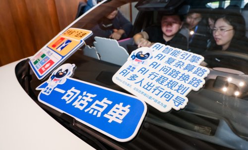Why are major AI companies racing to partner with automakers?