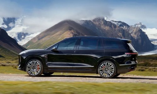 Who is defining the all-electric vehicle era?