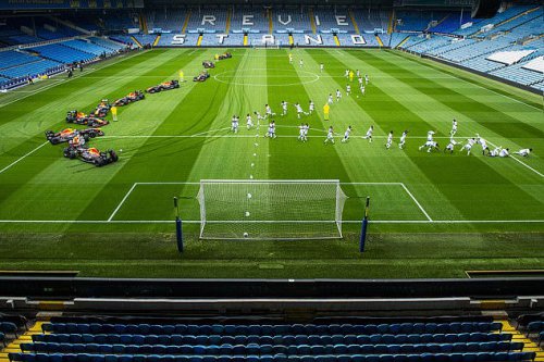Leeds stars race Red Bull F1 car at Elland Road after challenging driver to contest amid Premier League return