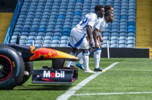 Leeds stars race Red Bull F1 car at Elland Road after challenging driver to contest amid Premier League return