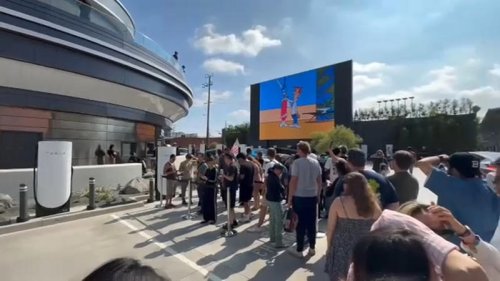 Tesla, Fans wait for hours to visit Tesla diner and drive-in movie theater in Hollywood on opening day