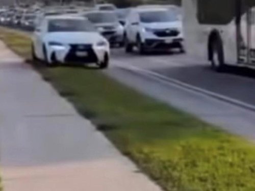 Lexus, Lexus driver charged after car filmed on Brampton sidewalk in viral video