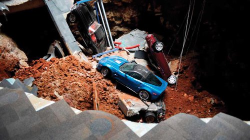 A C8 Corvette fell off a dealership lift, and it won't be the last