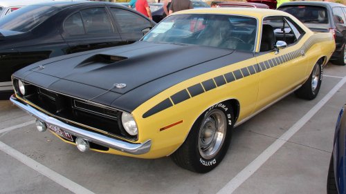 Why did muscle cars offer wild decal packages?