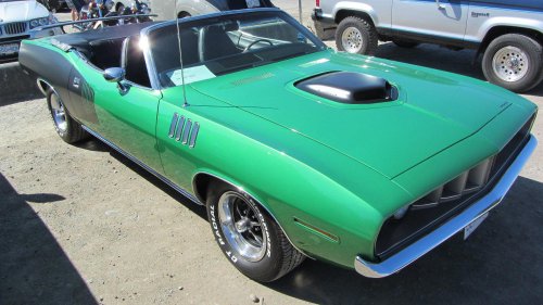 Why did muscle cars offer wild decal packages?