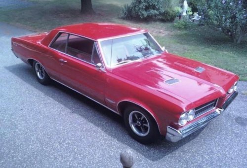 Guess the year based on the muscle car. Can you do it?