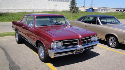 Back in 1964 the Pontiac GTO quietly outran sports cars and changed everything