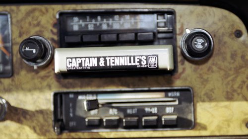 When did automakers switch from 8-track players to cassette decks?