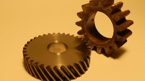 If straight cut gears are so great, why don't street cars use them?