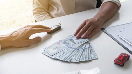 The common dealership fees that make a car's out-the-door price painful