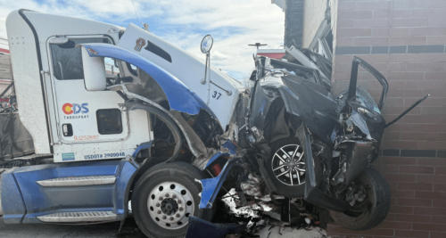 Semitrailer driver charged in crash into Littleton gas station