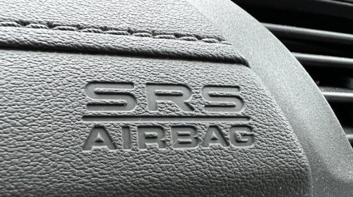 GM, GM introduced airbags so you wouldn't have to use a shoulder belt