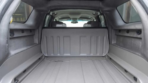 SUV, GMC, SUV or pickup? With the GMC Envoy XUV, you could have both