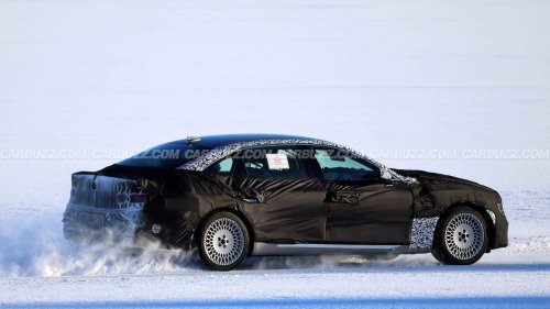 New Genesis G80 spied hiding hybrid powertrain under heavy camo