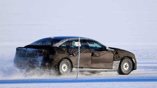 New Genesis G80 spied hiding hybrid powertrain under heavy camo