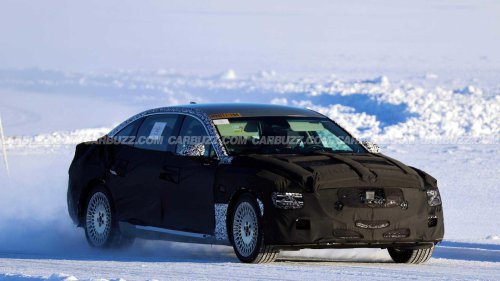 New Genesis G80 spied hiding hybrid powertrain under heavy camo