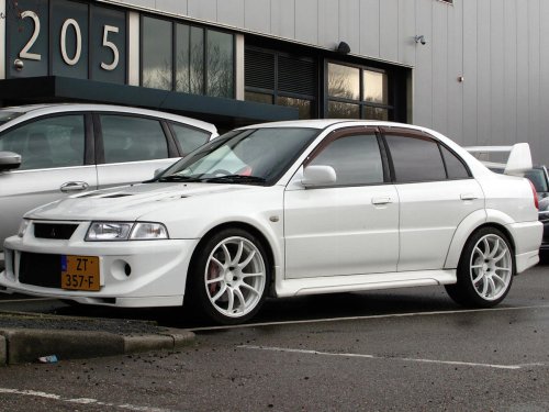 30 standout cars of the 1990s that shaped automotive history