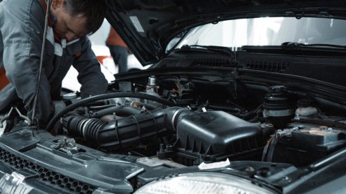 I paid for new spark plugs, but the engine still misfires and the shop says it’s unrelated