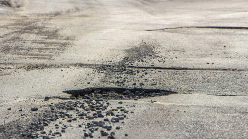 Driver says a pothole cracked his wheel and the city says the road was already repaired