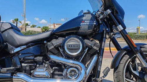 Why does Harley-Davidson's Milwaukee-Eight engine have four spark plugs?