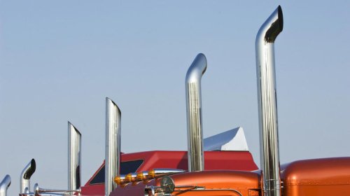 Why do semi trucks have vertical exhaust stacks?