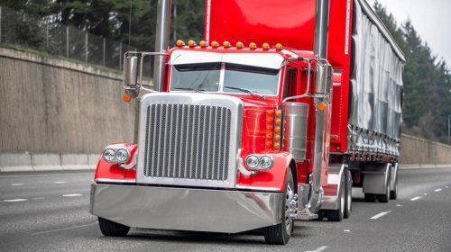 Why do semi trucks have vertical exhaust stacks?