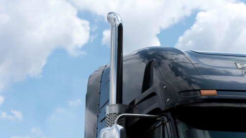Why do semi trucks have vertical exhaust stacks?