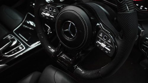 Why do some steering wheels have a flat bottom?