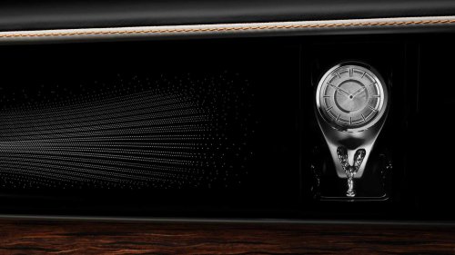 Forget hood ornaments, the new Rolls-Royce Spectre has a clock ornament