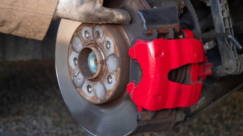 What does a brake caliper piston do and how many does the average car need?
