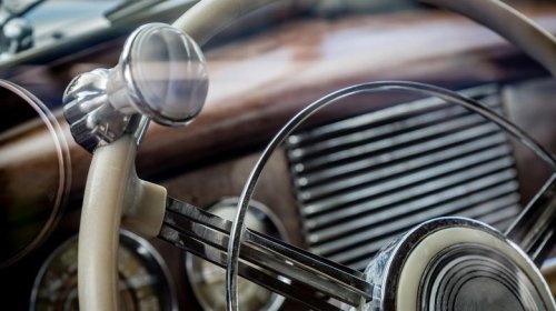 Why do people put knobs on steering wheels?