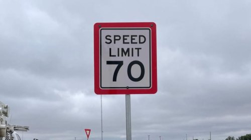 Why do some speed limit signs have a red border?