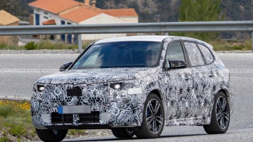 The 'Neue' BMW X1 spied with its quad exhaust pipes showing
