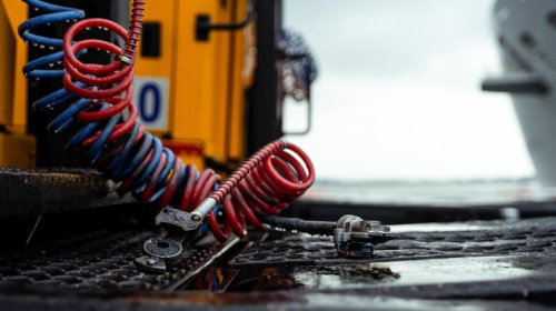What are those spiral hoses on semi trucks for?