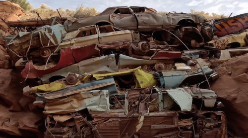 Why there's a wall of junk cars in a Utah canyon