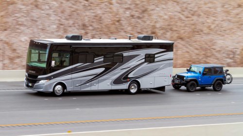 What to know (and what you need) before flat towing your Jeep