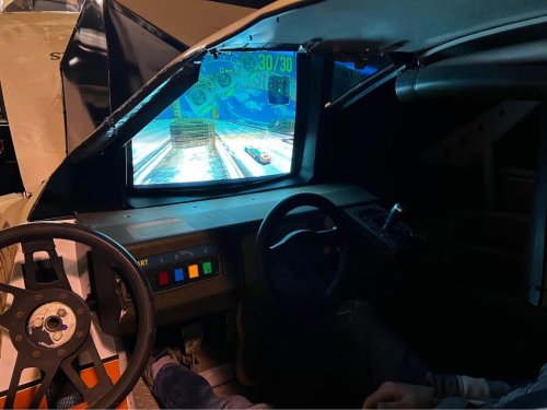 It doesn’t get cooler than a ’90s NASCAR sim rig running Daytona USA