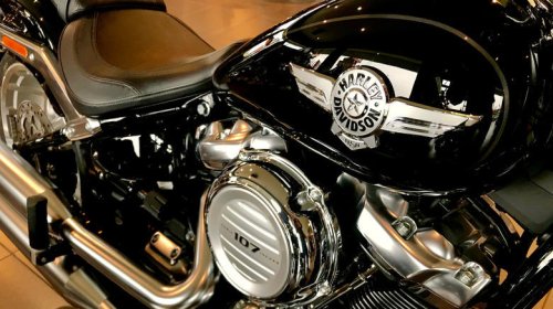 What does a compensator do on a Harley-Davidson?