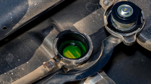 Do you need to drain old coolant before adding more to your car?