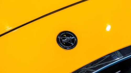 This astronaut drove the first mid-engined car, then the sports car world followed